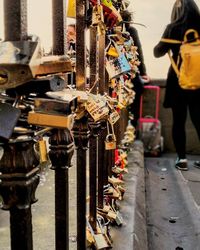 Close-up of padlocks on railing