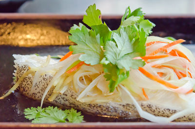 Close-up of vegetables in plate on table