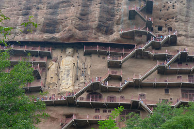 High angle view of bridge over river by buildings