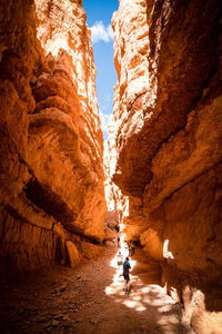 People amidst rock formation