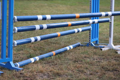 Row of pipes on field