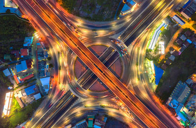 High angle view of light trails on city street at night