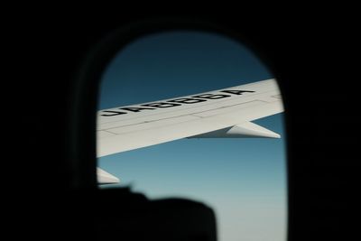 Low angle view of sky seen through window