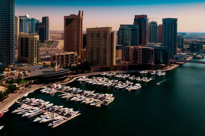 Aerial view of city and buildings against sky