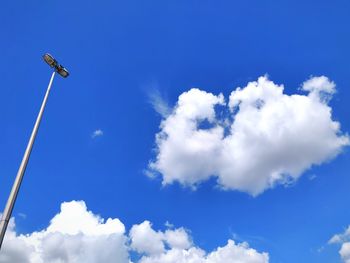 Low angle view of street light against sky