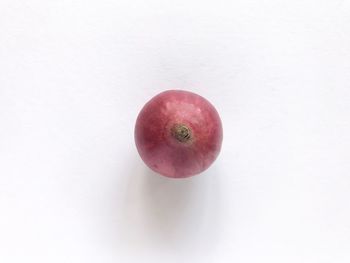 High angle view of apple against white background