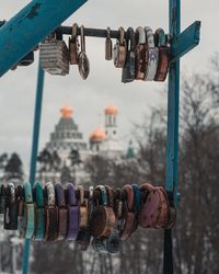 Padlocks hanging on railing