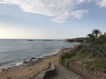 Scenic view of beach against sky