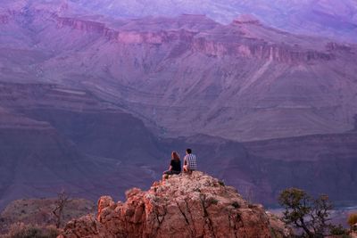 Man on rock in mountains