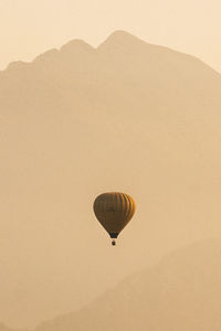 Hot air balloon flying in sky