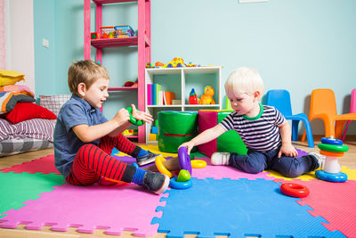 Students playing with toys