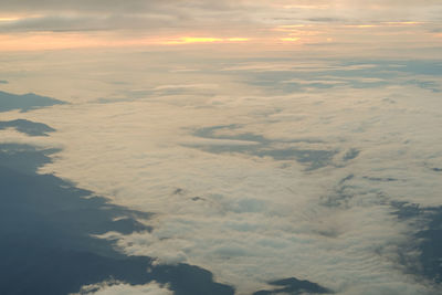 Aerial view of cloudscape against sky during sunset