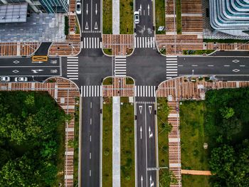 High angle view of street amidst trees in city