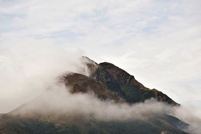 Scenic view of rocky mountains against sky