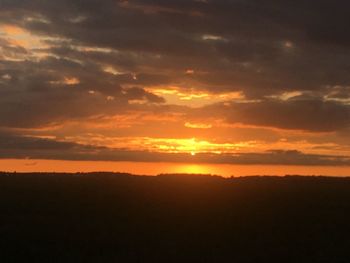 Scenic view of sunset over landscape