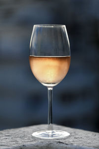 Close-up of wineglass on table