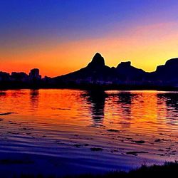 Scenic view of lake at sunset