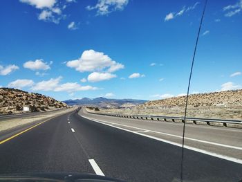 Empty road passing through highway