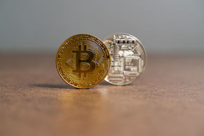 Close-up of coins on table