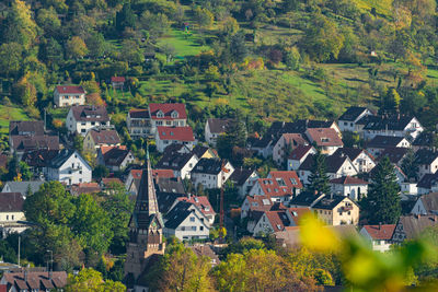 High angle view of townscape and trees in town