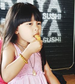 Portrait of a girl eating food
