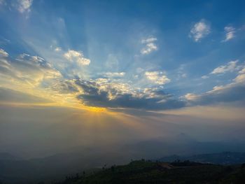 Scenic view of landscape against sky during sunset