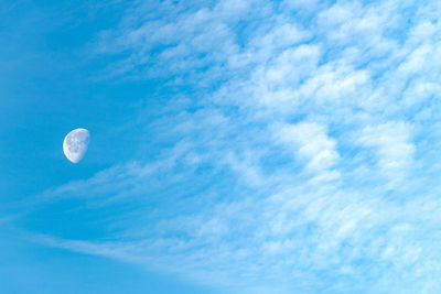 Low angle view of moon in sky