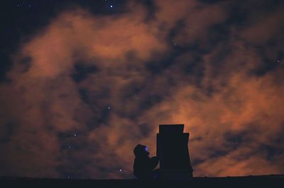 Woman looking at sunset