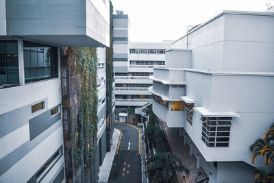 Buildings in city against sky