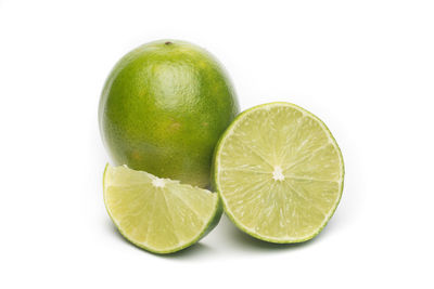 Close-up of fruits against white background