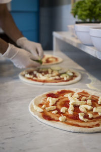 Midsection of person preparing food