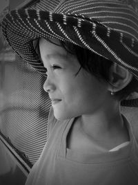 Close-up of girl wearing hat