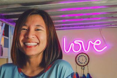 Portrait of smiling young woman