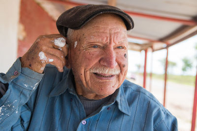 South american senior adult man smiling