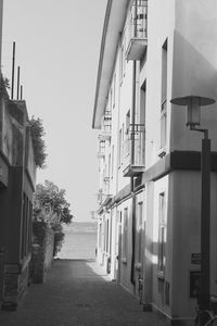 Narrow walkway along houses