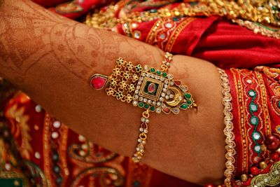 Close-up of bride wearing jewelry