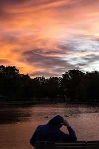 Scenic view of dramatic sky at sunset