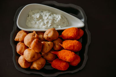 High angle view of eggs in container on table