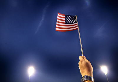 Low angle view of flag against sky