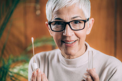 Portrait of smiling man wearing eyeglasses