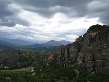 View of mountain range against cloudy sky