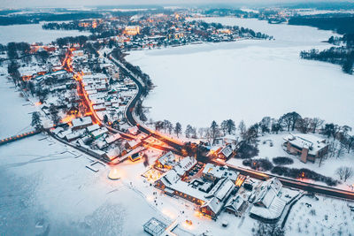 High angle view of city by building during winter