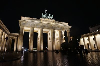 Low angle view of statue at night