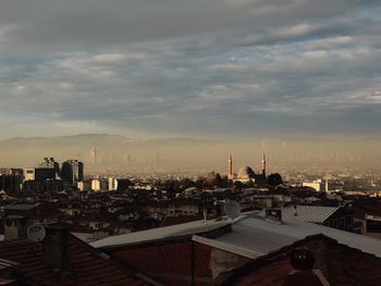 Cityscape against sky during sunset