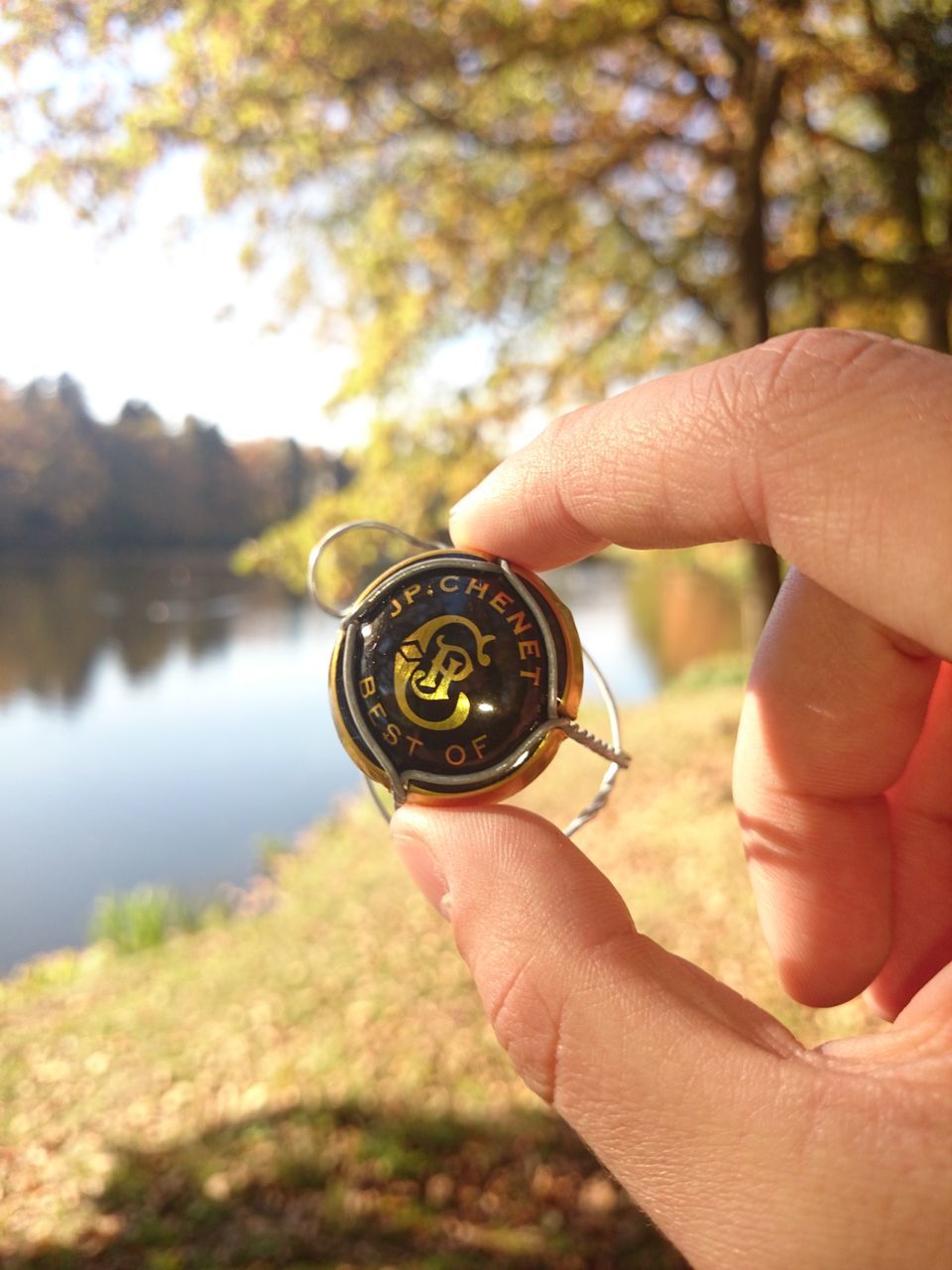 person, part of, holding, human finger, close-up, cropped, focus on foreground, unrecognizable person, leisure activity, selective focus, lifestyles, men, ring, day, outdoors, showing, circle