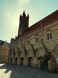 Low angle view of old building against sky