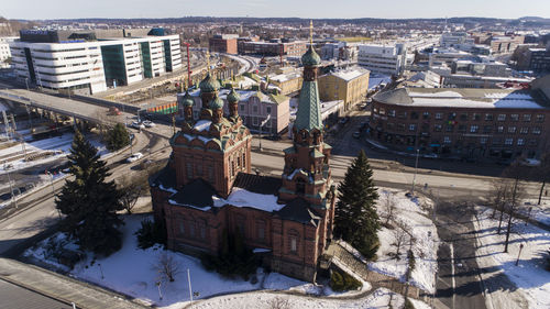 High angle view of buildings in city during winter