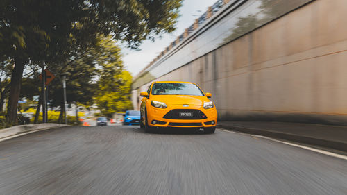 Yellow car on road