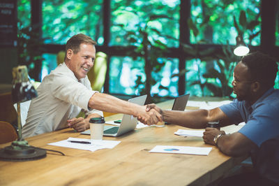 Business colleagues working at office