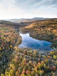 Scenic view of lake against sky during autumn